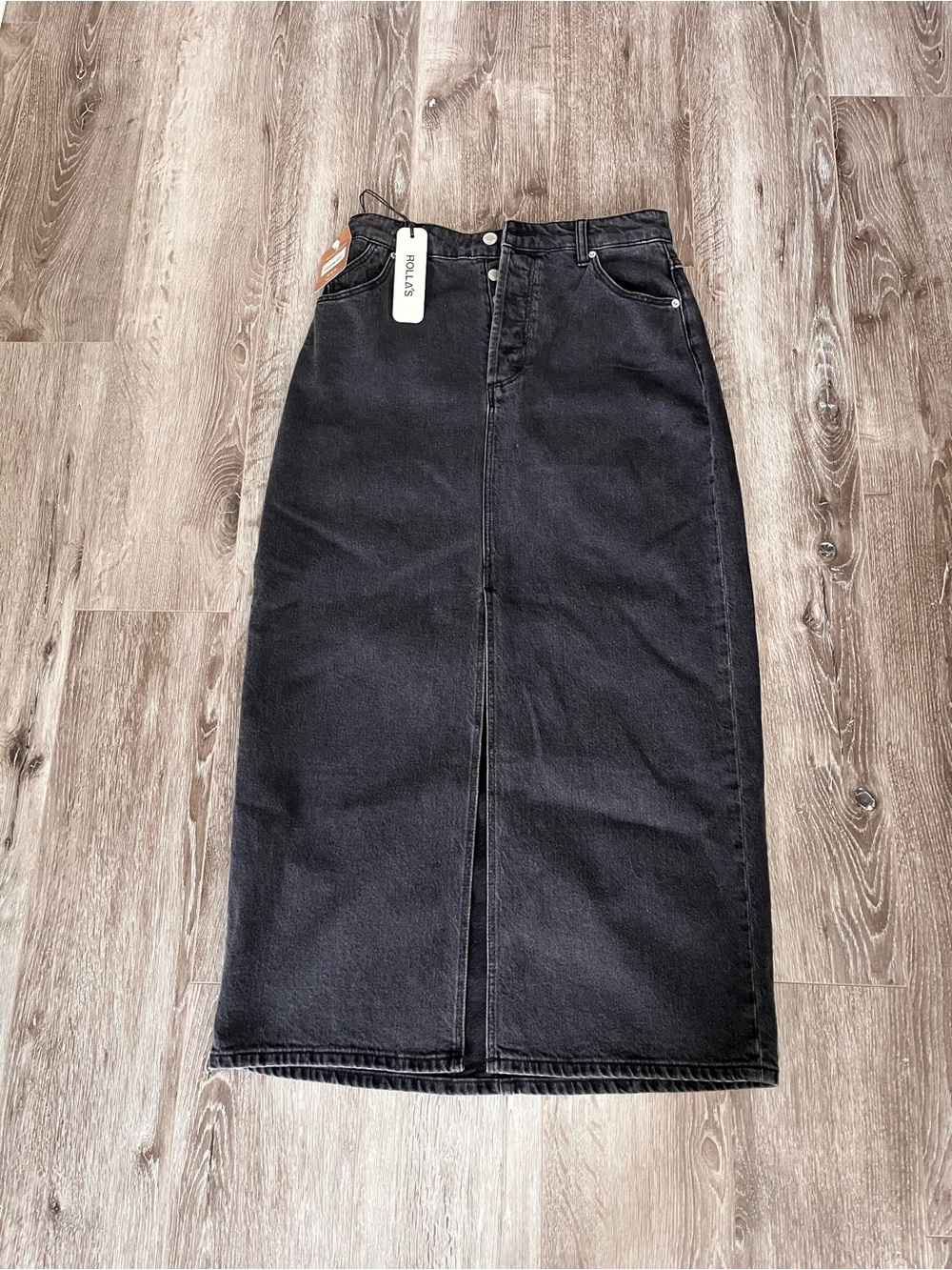 ROLLA’S Black Denim Midi Skirt
Size 28
New with tags
